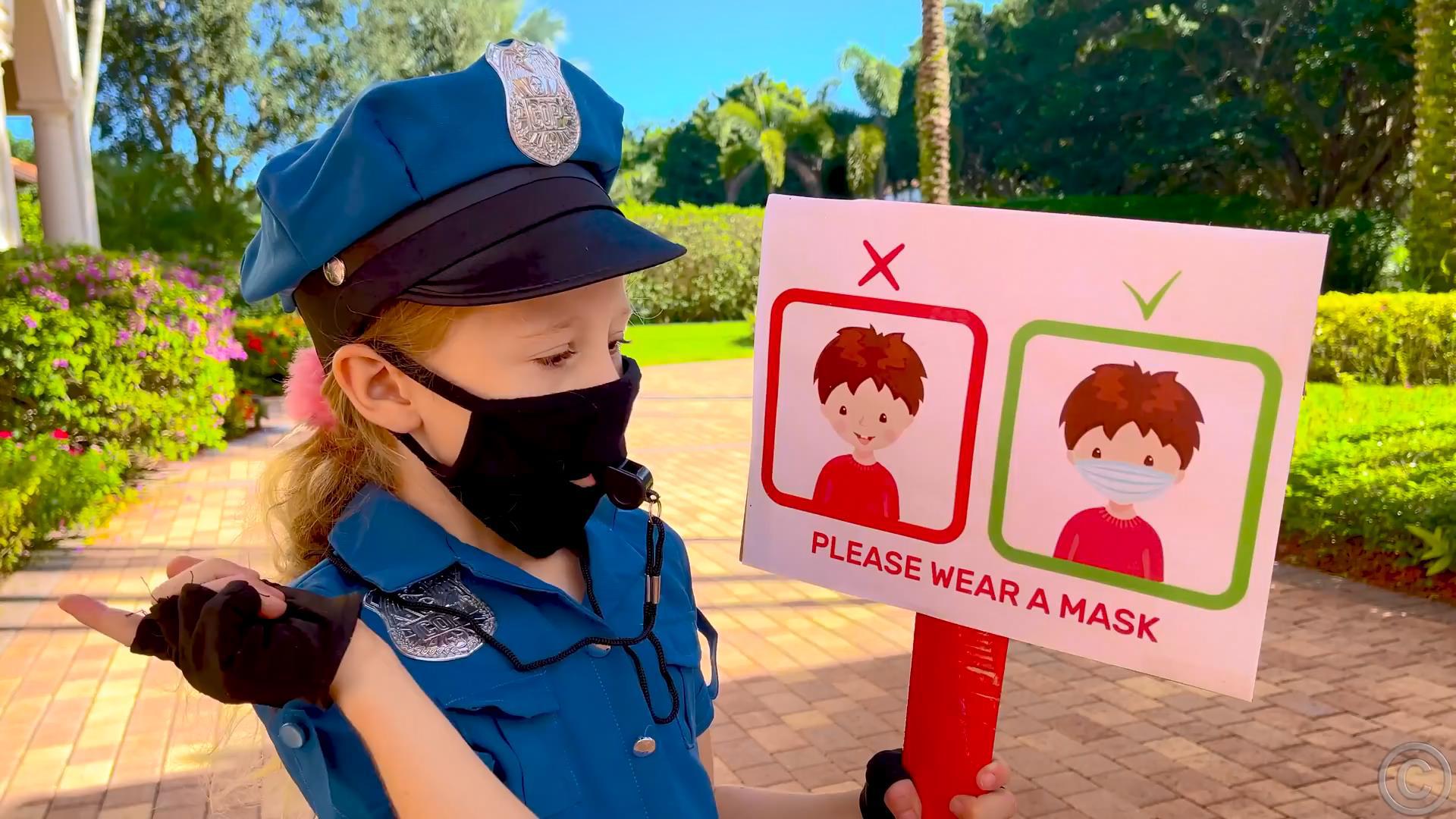 Nastya teaches dad to wear a mask as a policeman